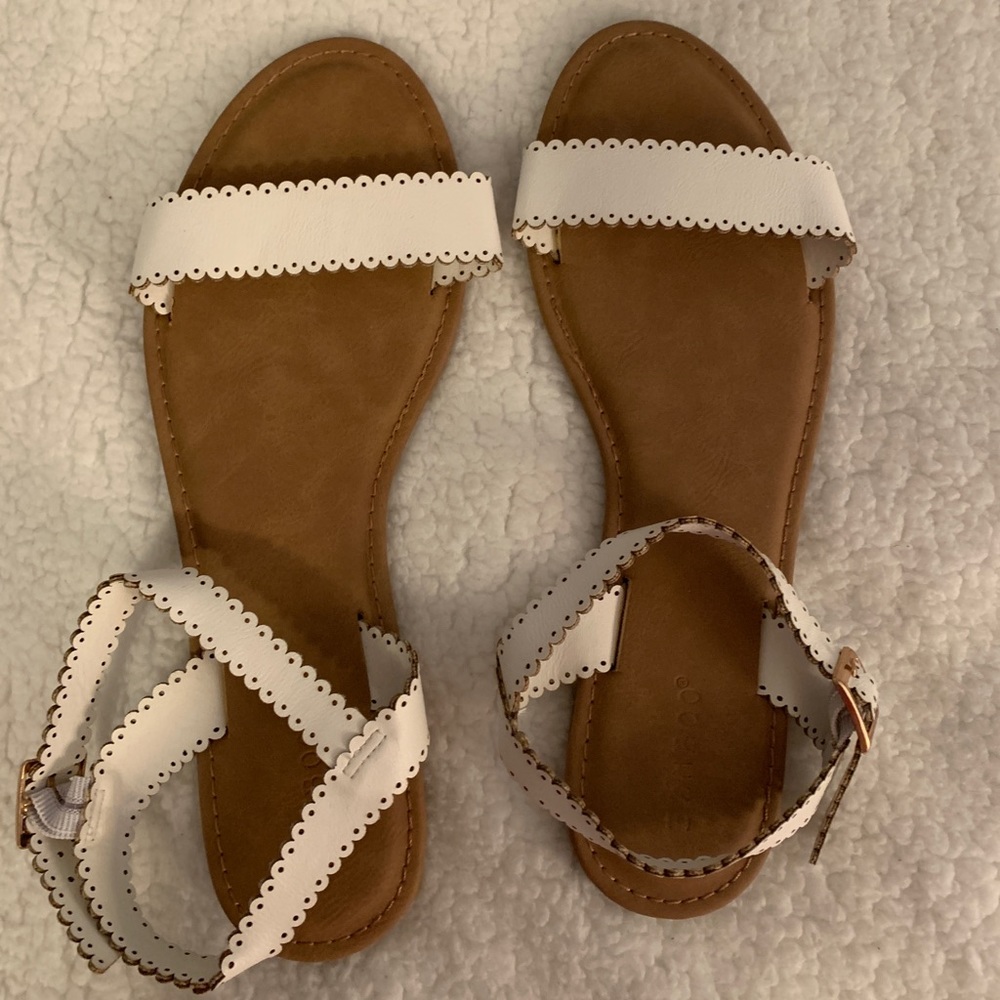 Brown and white sandals